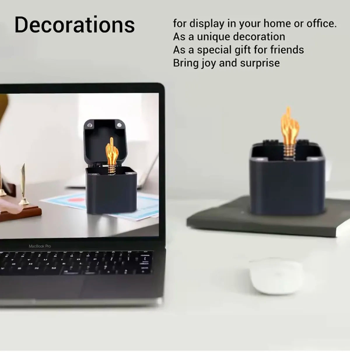 Black middle finger pop-up prank gift box with gold-coloured surprise